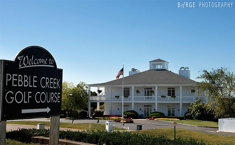 Pebble Creek Golf Course clubhouse and course image from the official Pebble Creek website